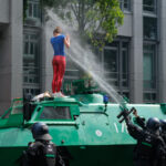 Foto simbolo delle proteste al G20 di Amburgo
