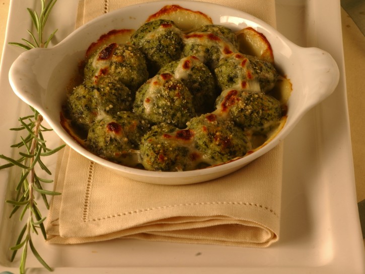 Polpette verdi di semolino al gratin
