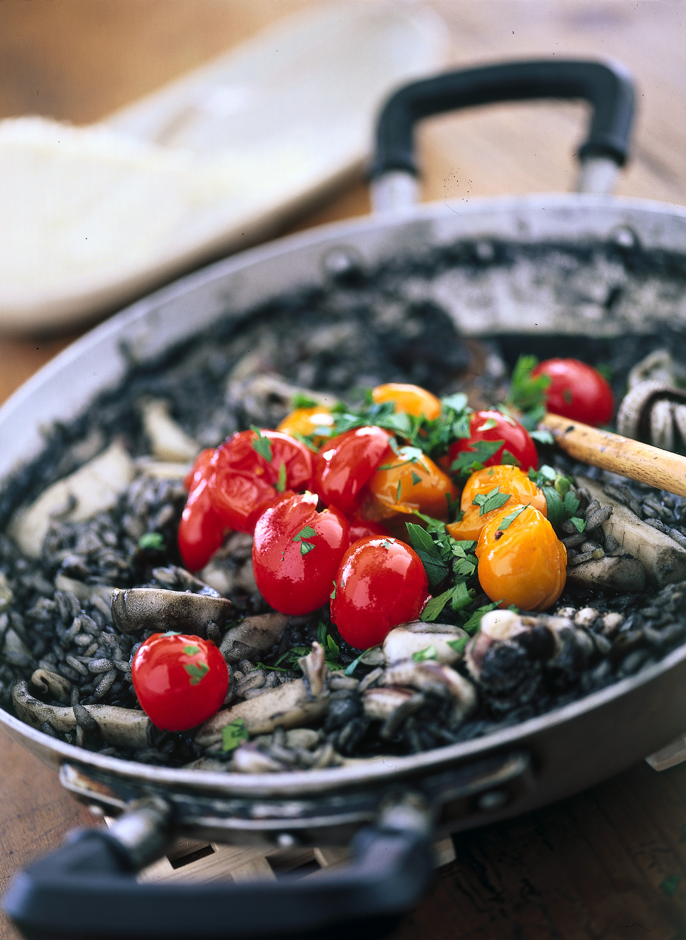 Ricetta Riso al nero di seppia con pomodorini Donna Moderna