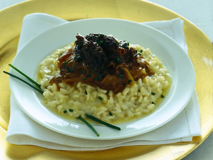 Risotto con fonduta di formaggi e spugnole