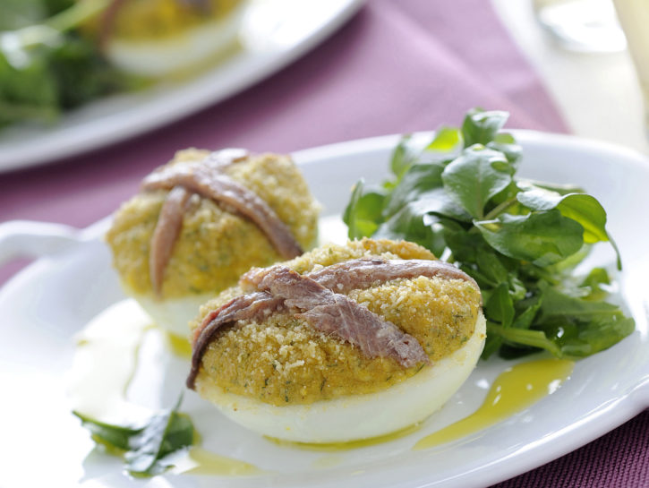 Uova ripiene gratinate