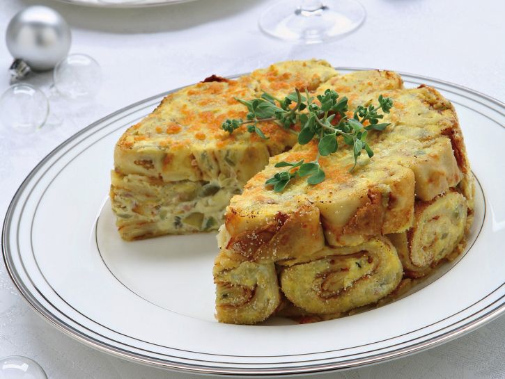 timballo-di-crespelle-con-carciofi-e-ricotta preparazione