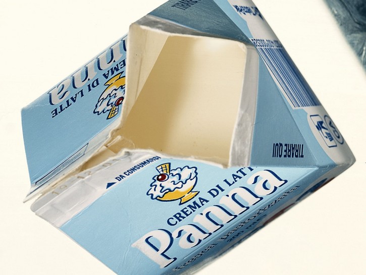 Prugne cotte con panna montata