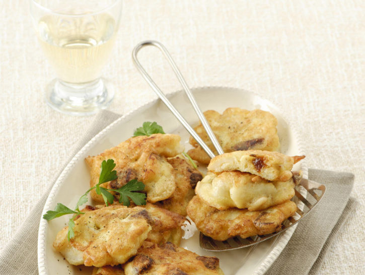 Frittelle di stoccafisso, pinoli e prugne secche