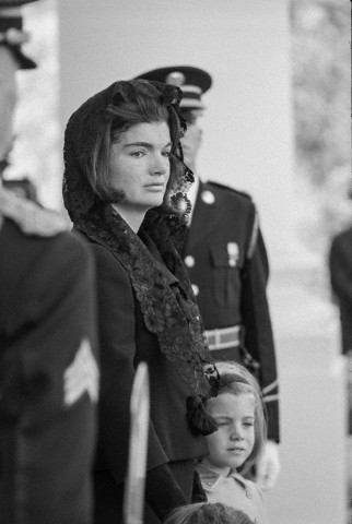 Jackie leaves The White House during funeral