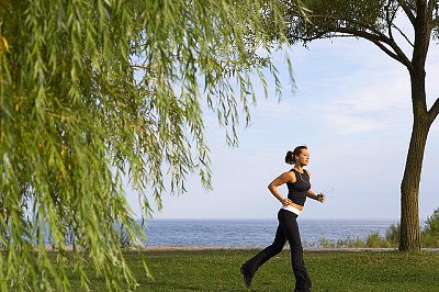 Woman Running in Park