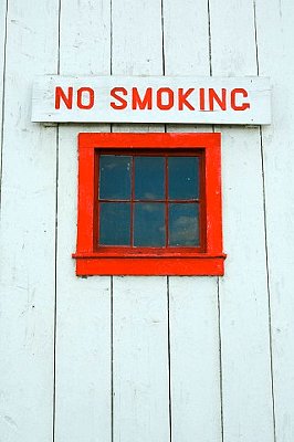 A sign above a window.