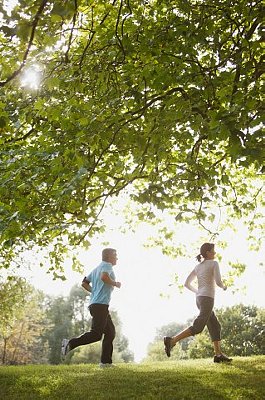 Couple jogging together outdoors