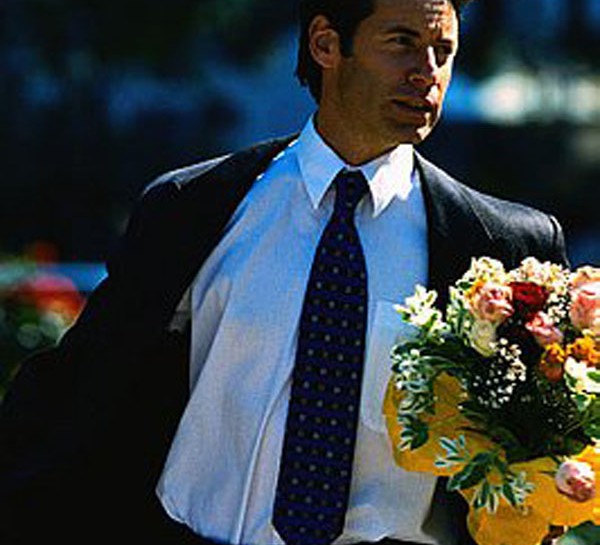 Businessman Carrying Bouquet