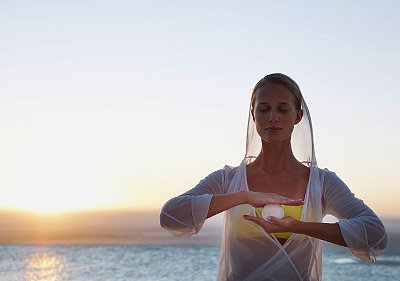 Woman with an orb between her hands