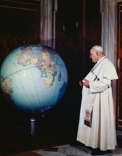 Pope John XXIII Looking at Globe