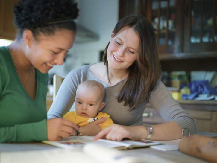 Teen girls with baby