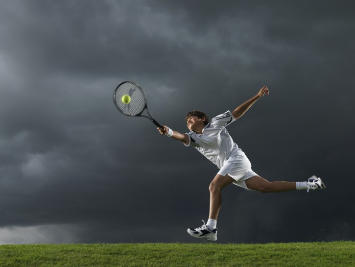 Boy Playing Tennis