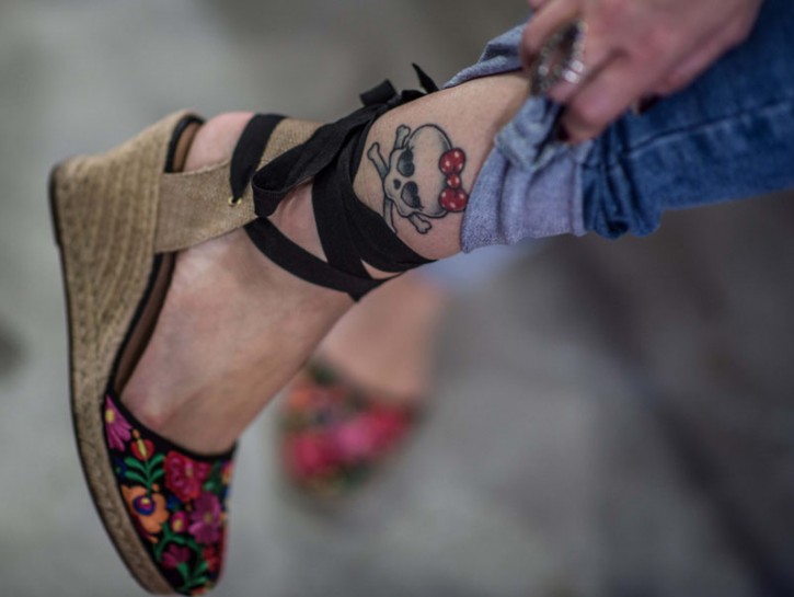 Tatuaggio caviglia donna