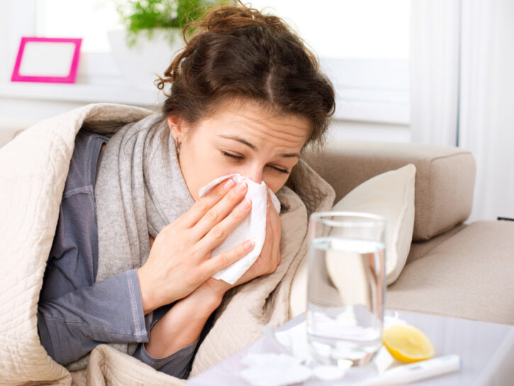 Donna influenza letto termometro vitamina c