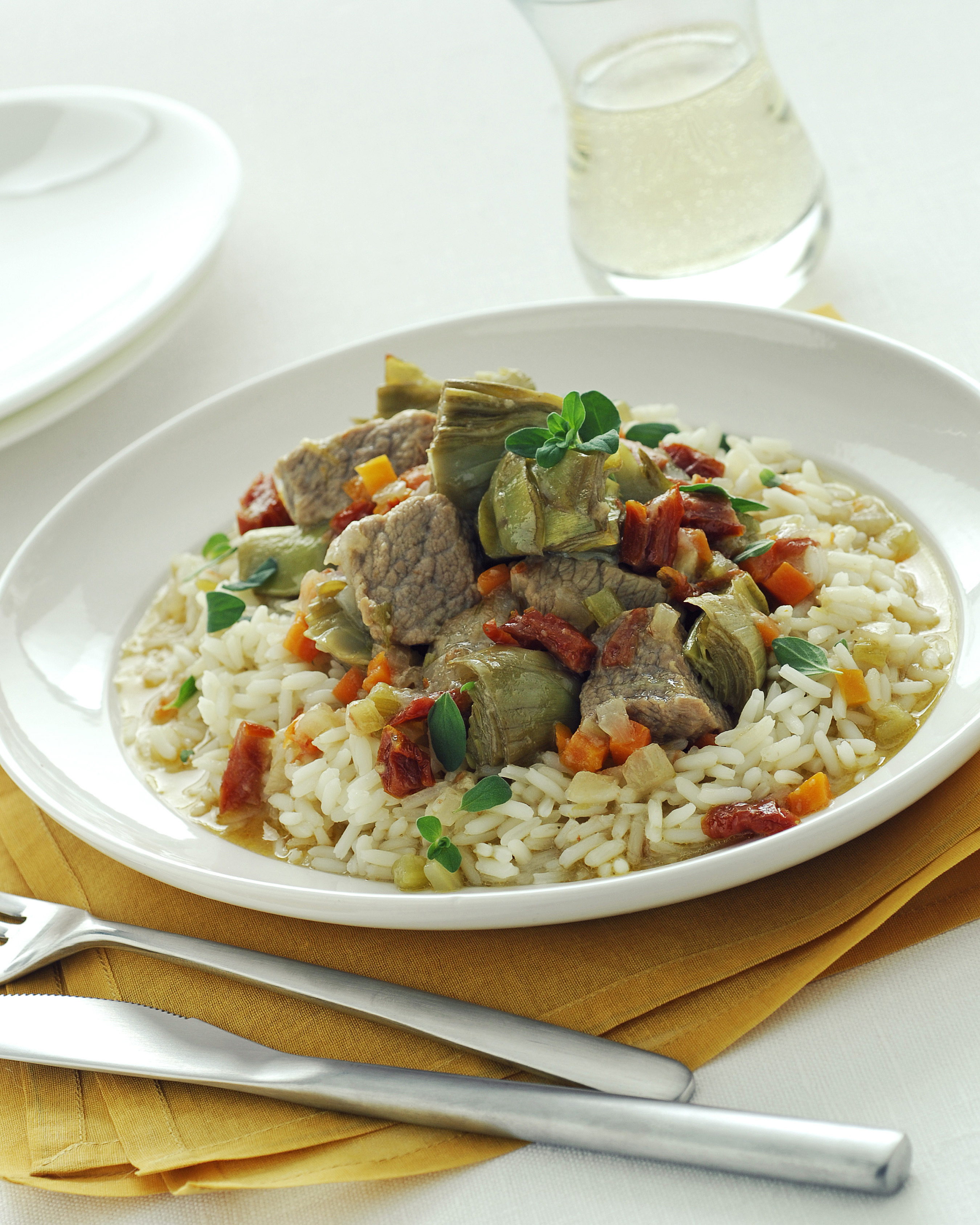 Ricetta Riso pilaf con vitello e carciofi | Donna Moderna