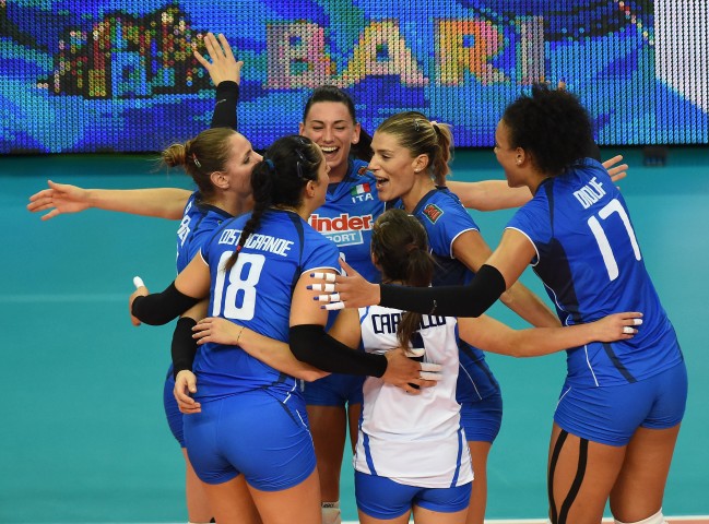 BARI, ITALY - OCTOBER 05: Players of Italy celebrate during the FIVB Women's World Championship pool E match between Italy and China on October 5, 2014 in Bari, Italy . (Photo by Giuseppe Bellini/Getty Images for FIVB)