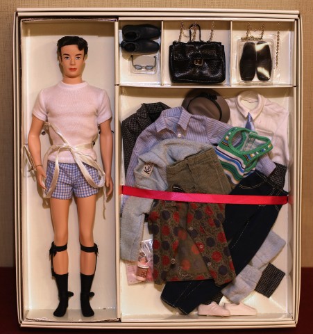 ARLINGTON, VA - JULY 31: A vintage Ken doll with a full wardrobe is part of the charity raffle during the 2015 National Barbie Doll Collectors Convention at the Hyatt Regency Crystal City hotel July 31, 2015 in Arlington, Virginia. Now in its 35th year, the convention draws hundreds of collectors and fans from around the world for a week-long celebration of Barbie and the cultural phenomena that surrounds the famous fashion doll. (Photo by Chip Somodevilla/Getty Images)