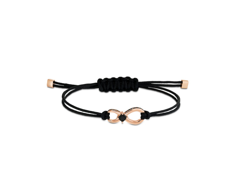 <p>Bracciale con laccio e charm con simbolo dell'infinito (SWAROVSKI)</p>